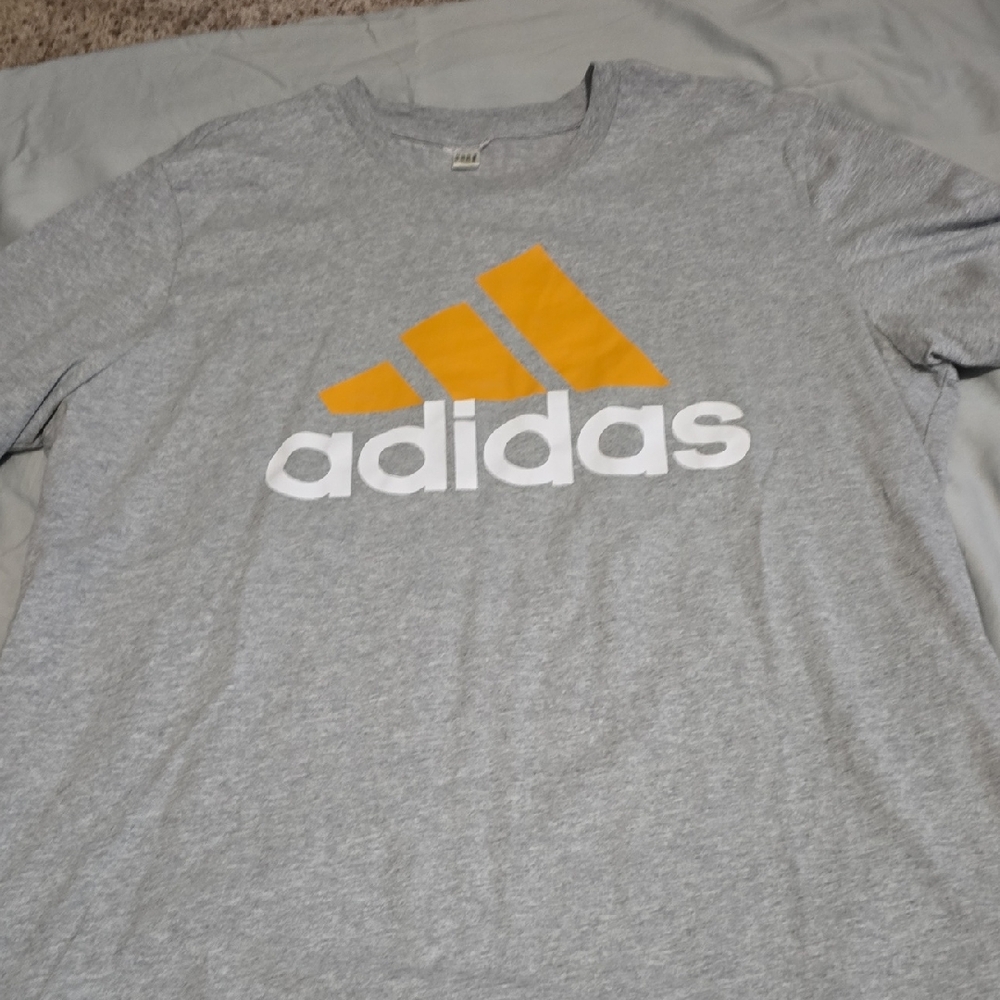 Adidas Heather Gray Tee with Vibrant Yellow Logo